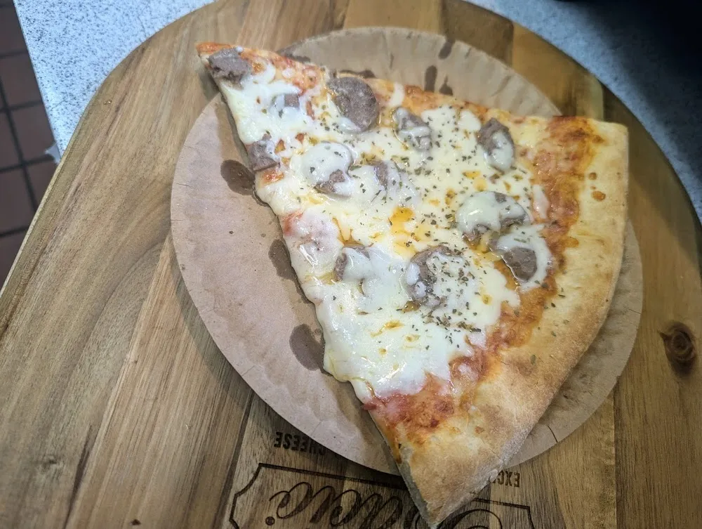 Pizza by the Slice Pizza